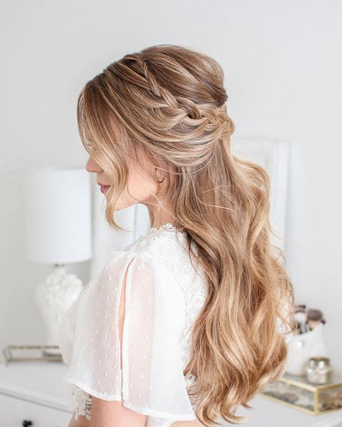 Half up hairstyle with curtain bangs