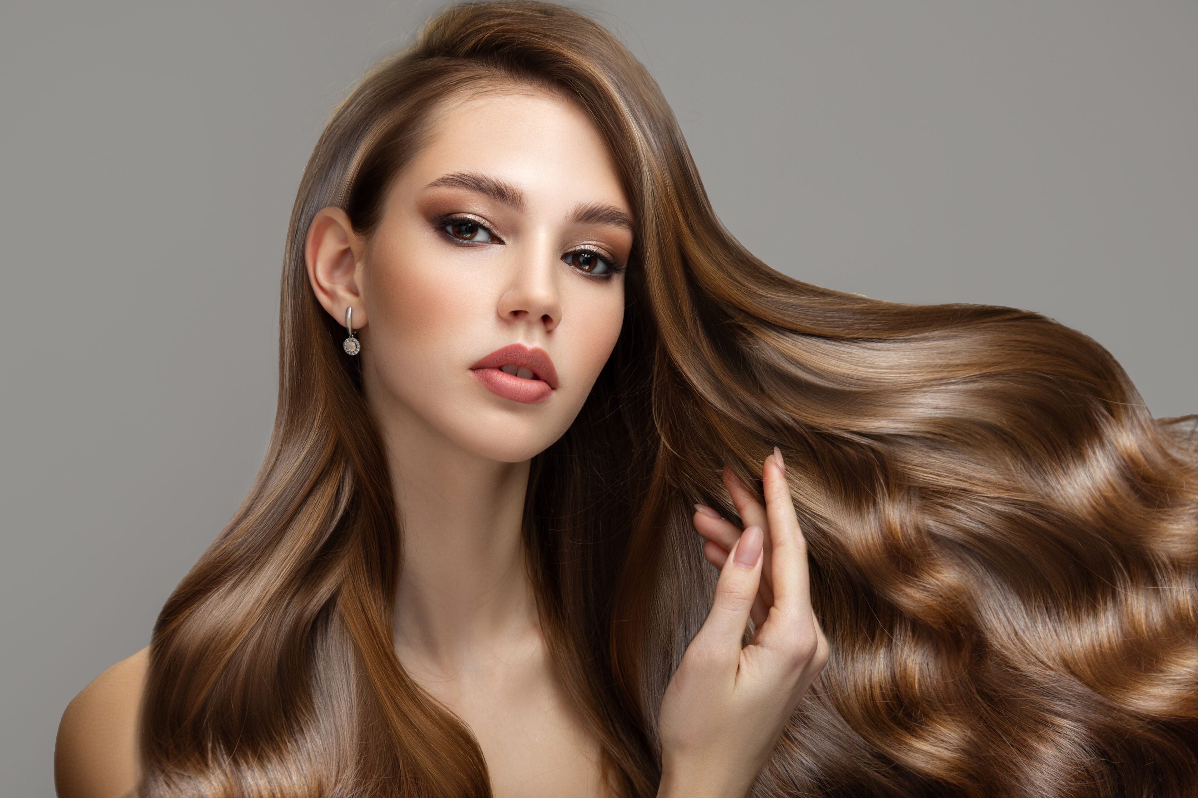 Beautiful girl with long wavy hair