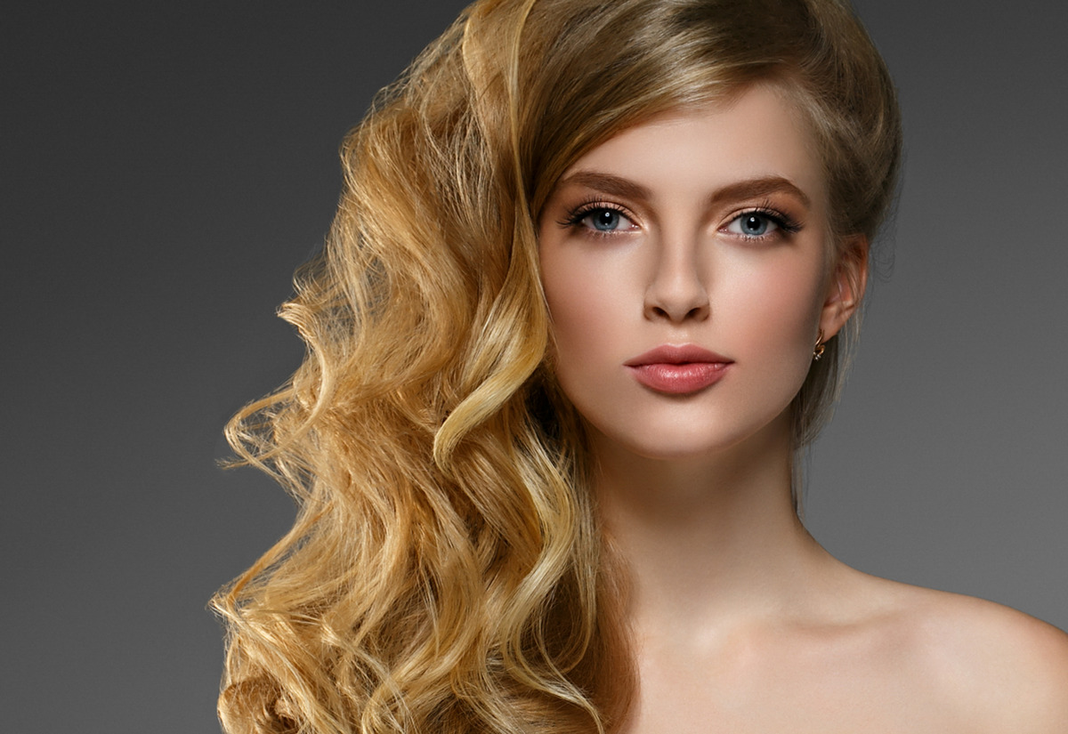Long curly hair blonde woman skin care beautiful portrait