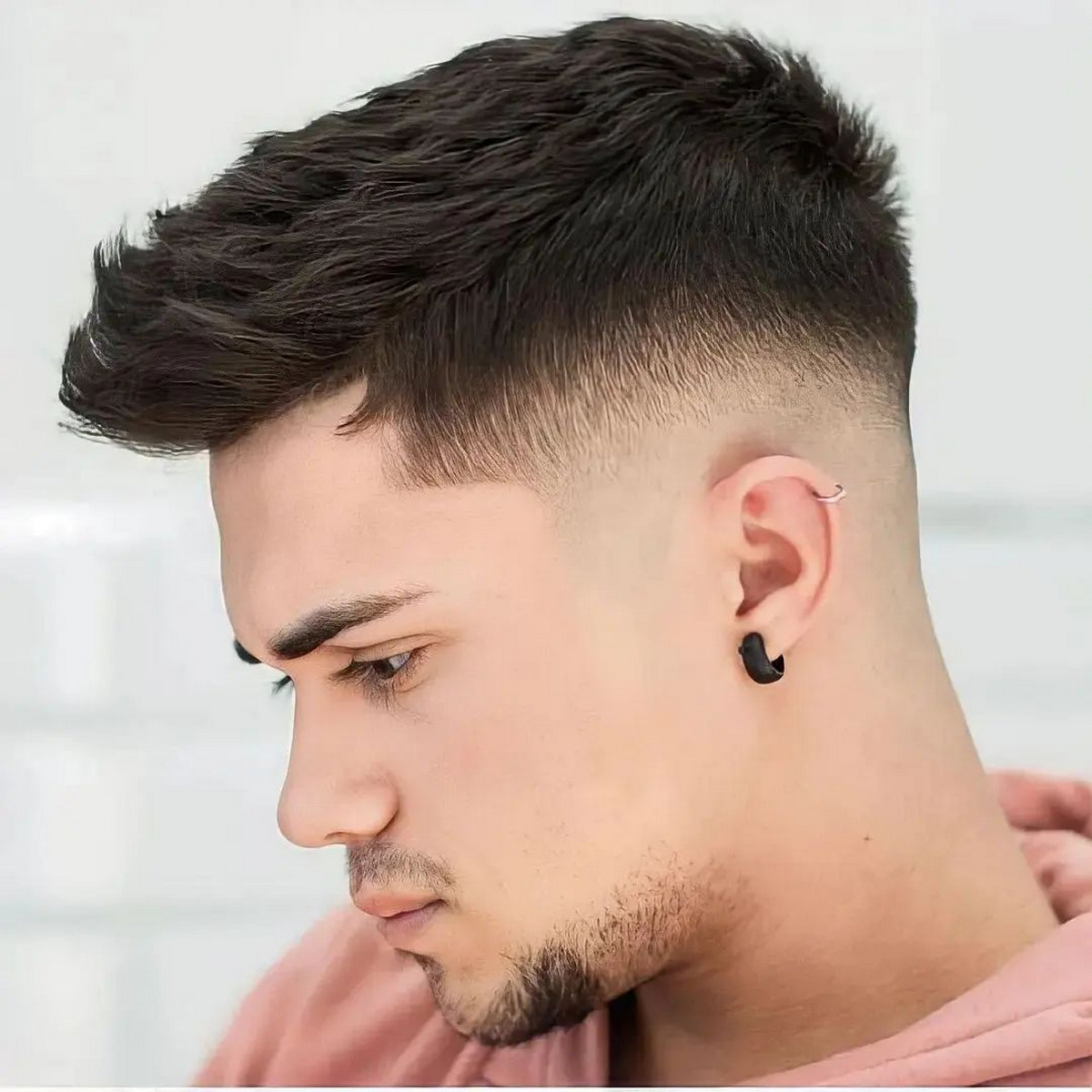 Man with mid-fade hair
