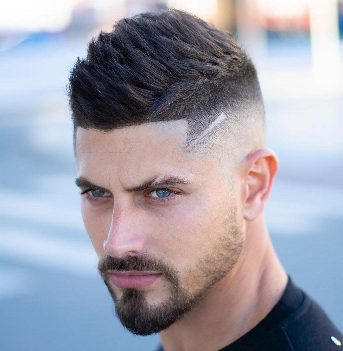 Men with faux hawk fade hair