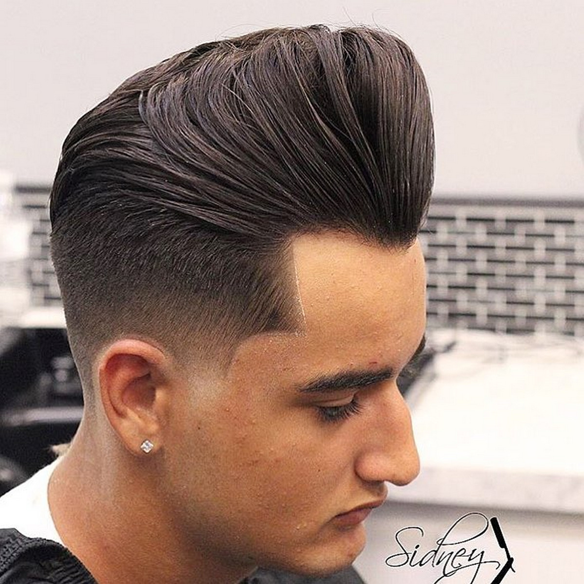 Men with pompadour fade hair