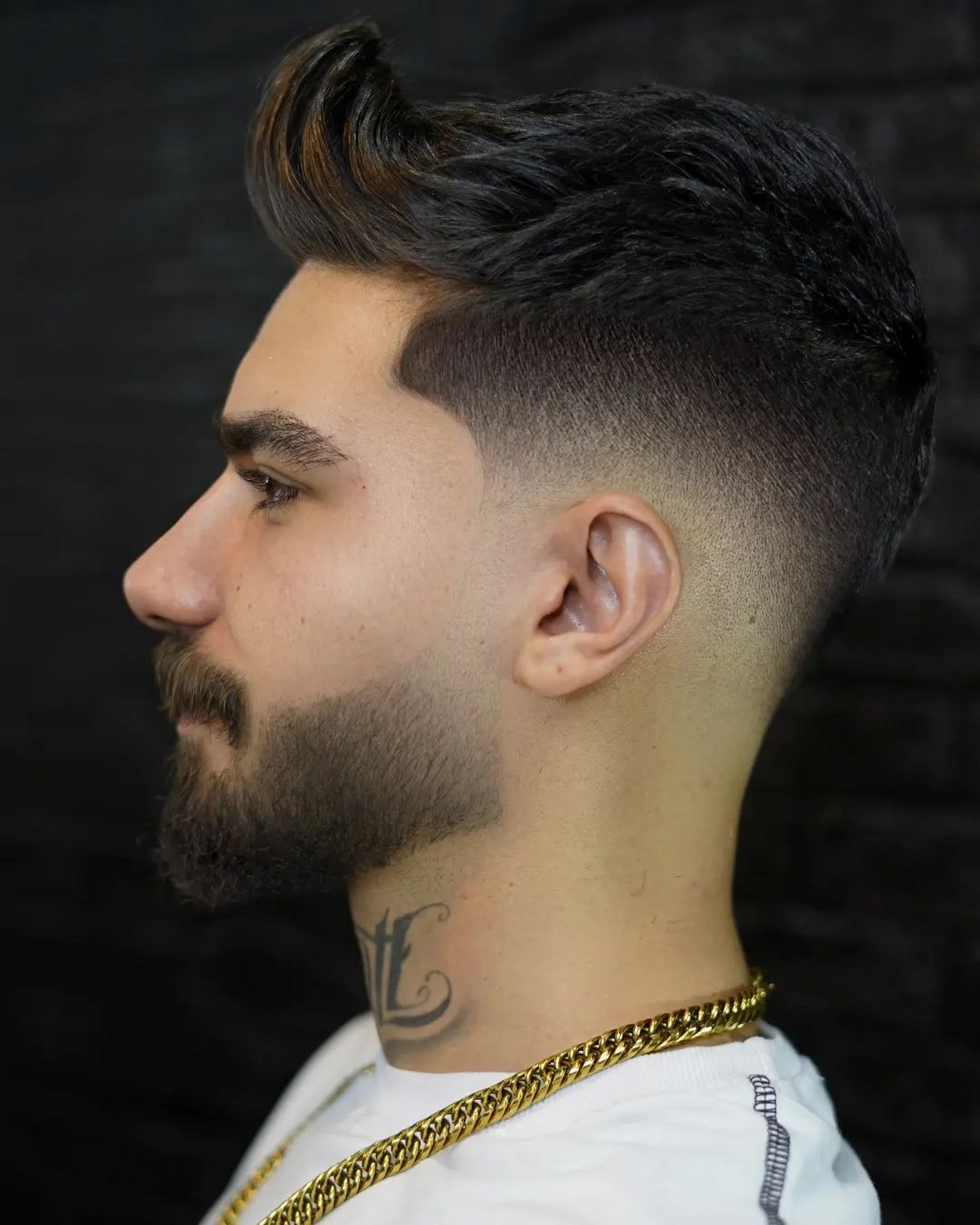 Men with spiky fade hair via