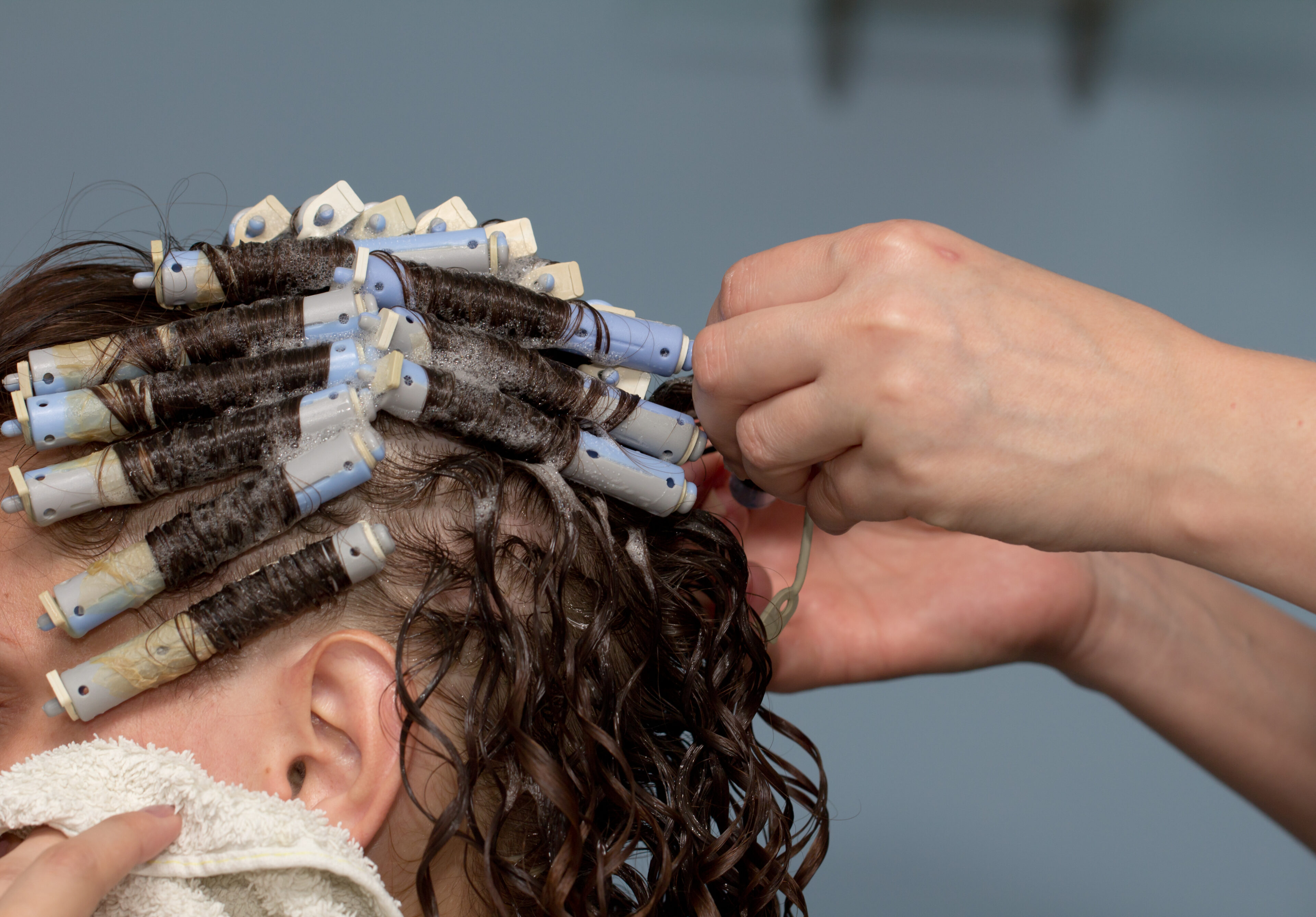 Unclip and begin applying the perm solution