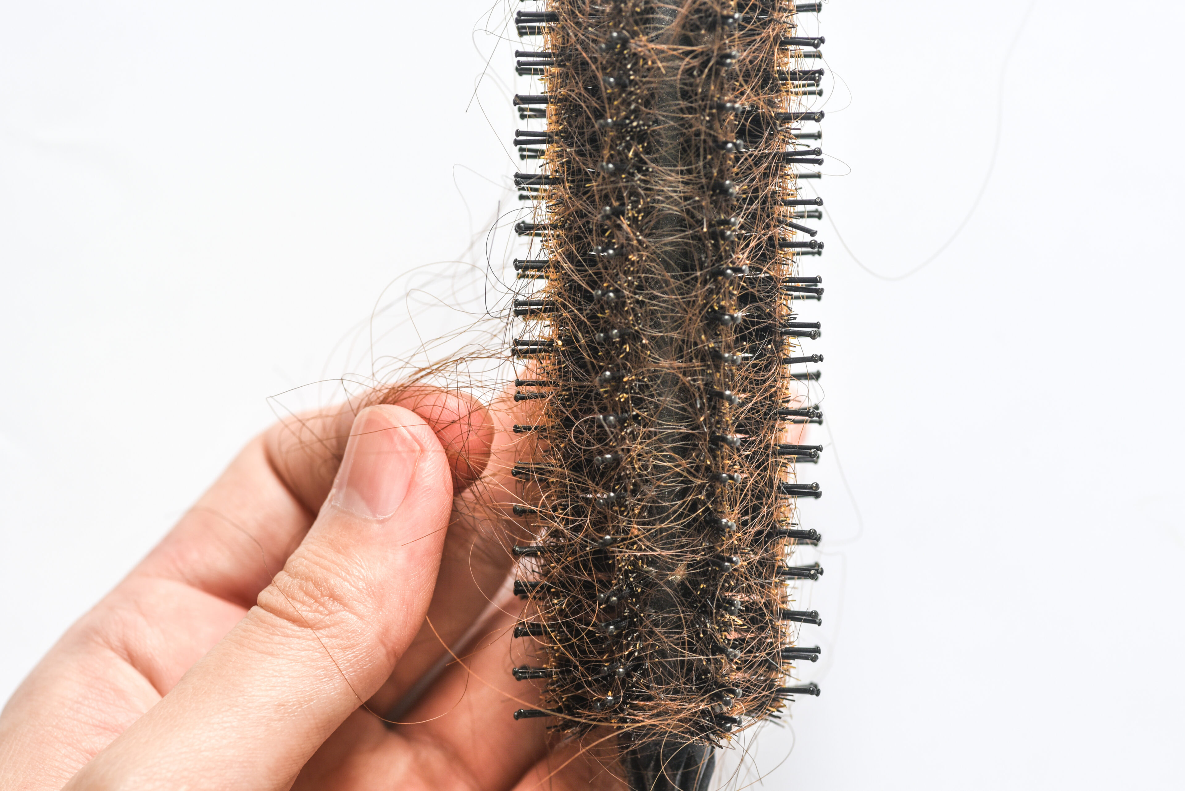 A dirty hair dryer brush