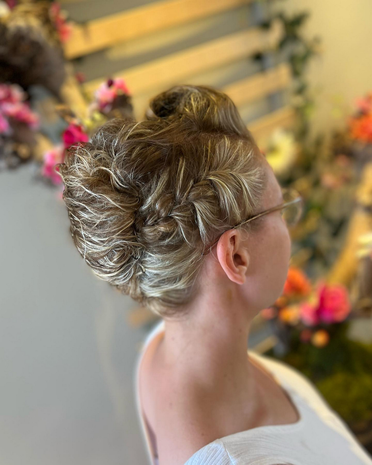 Roll and tuck updo neat and loose