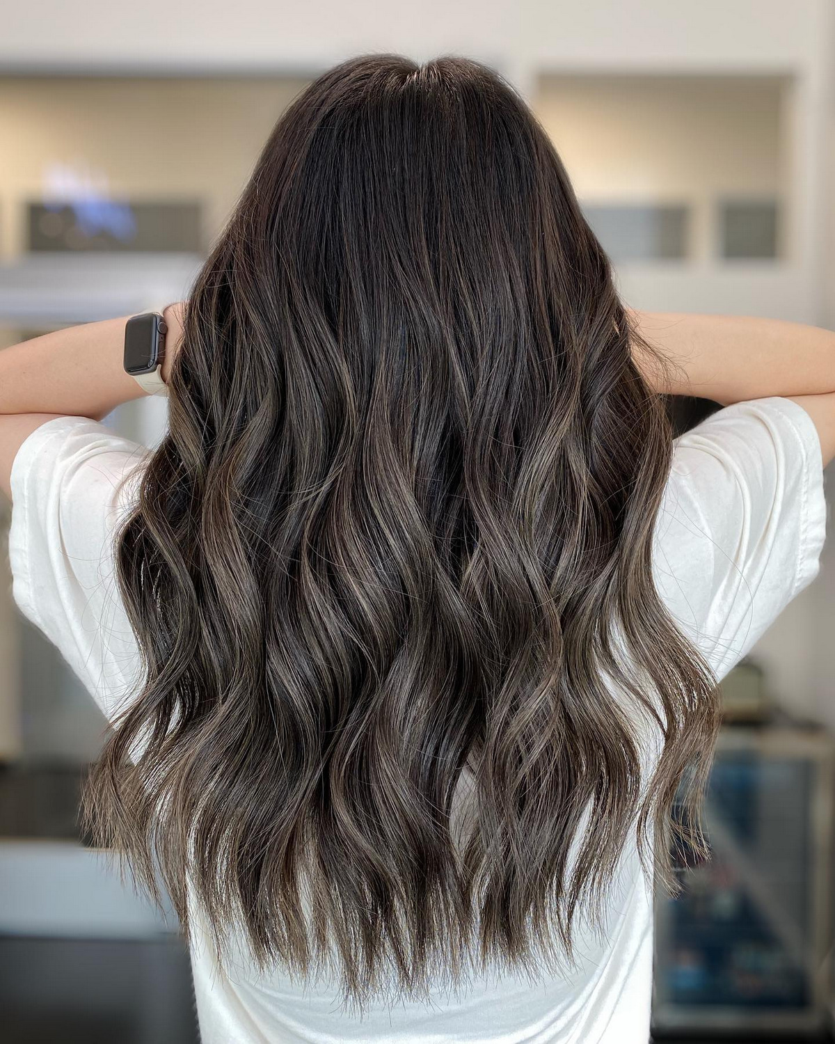 She has coarse hair with dark ash brown for Sally