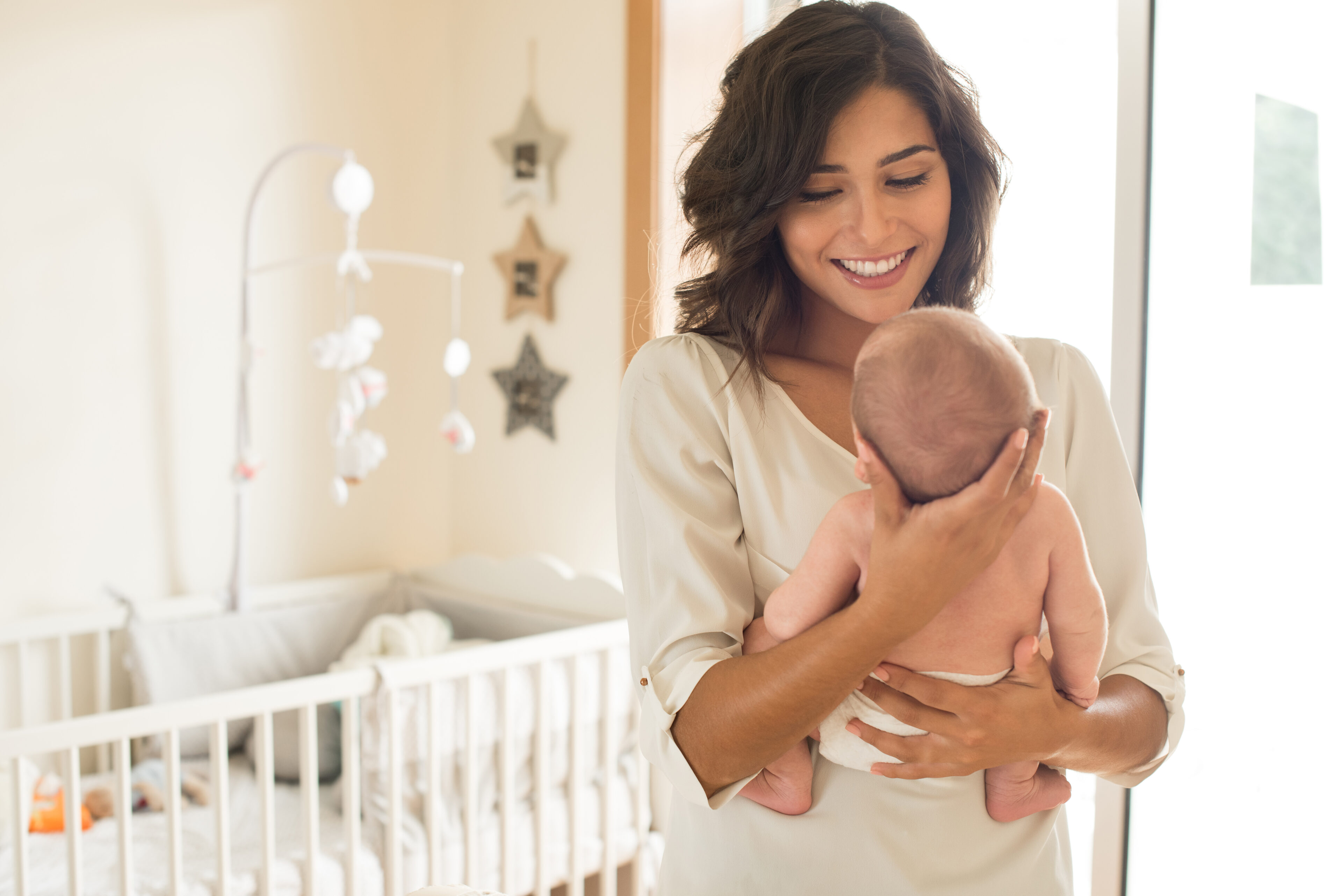 A mom is soothing her baby comfort