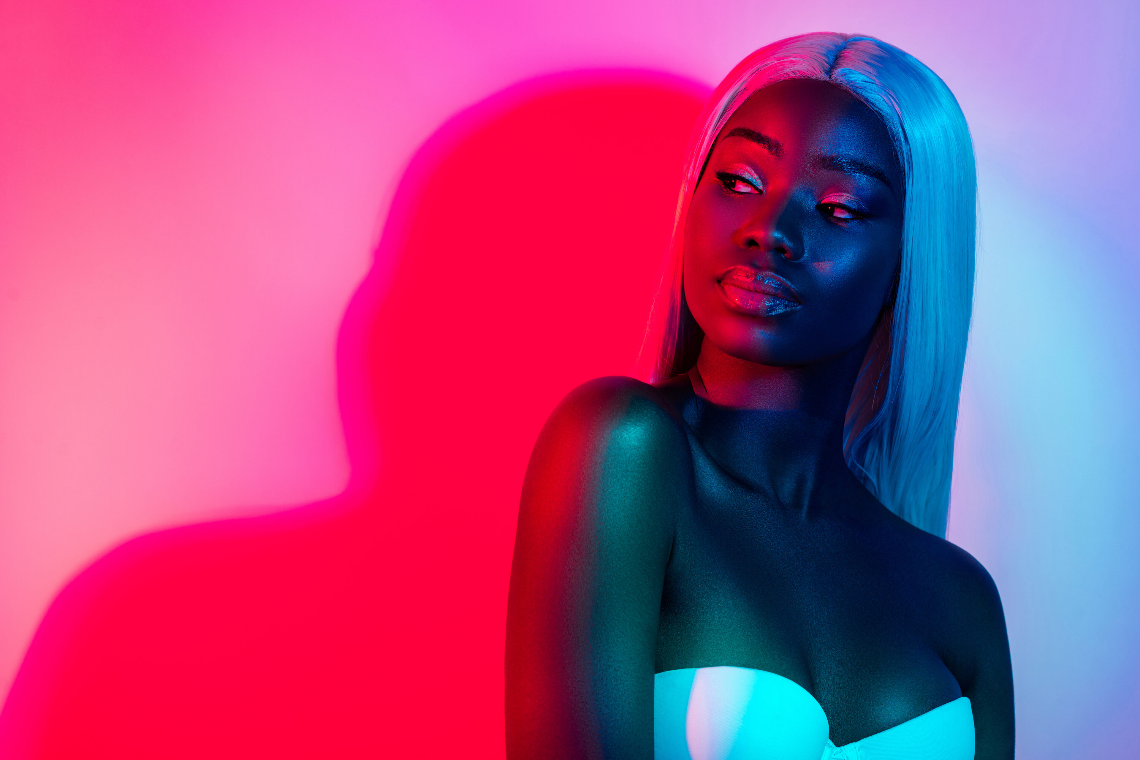 Why do black women wear wigs?