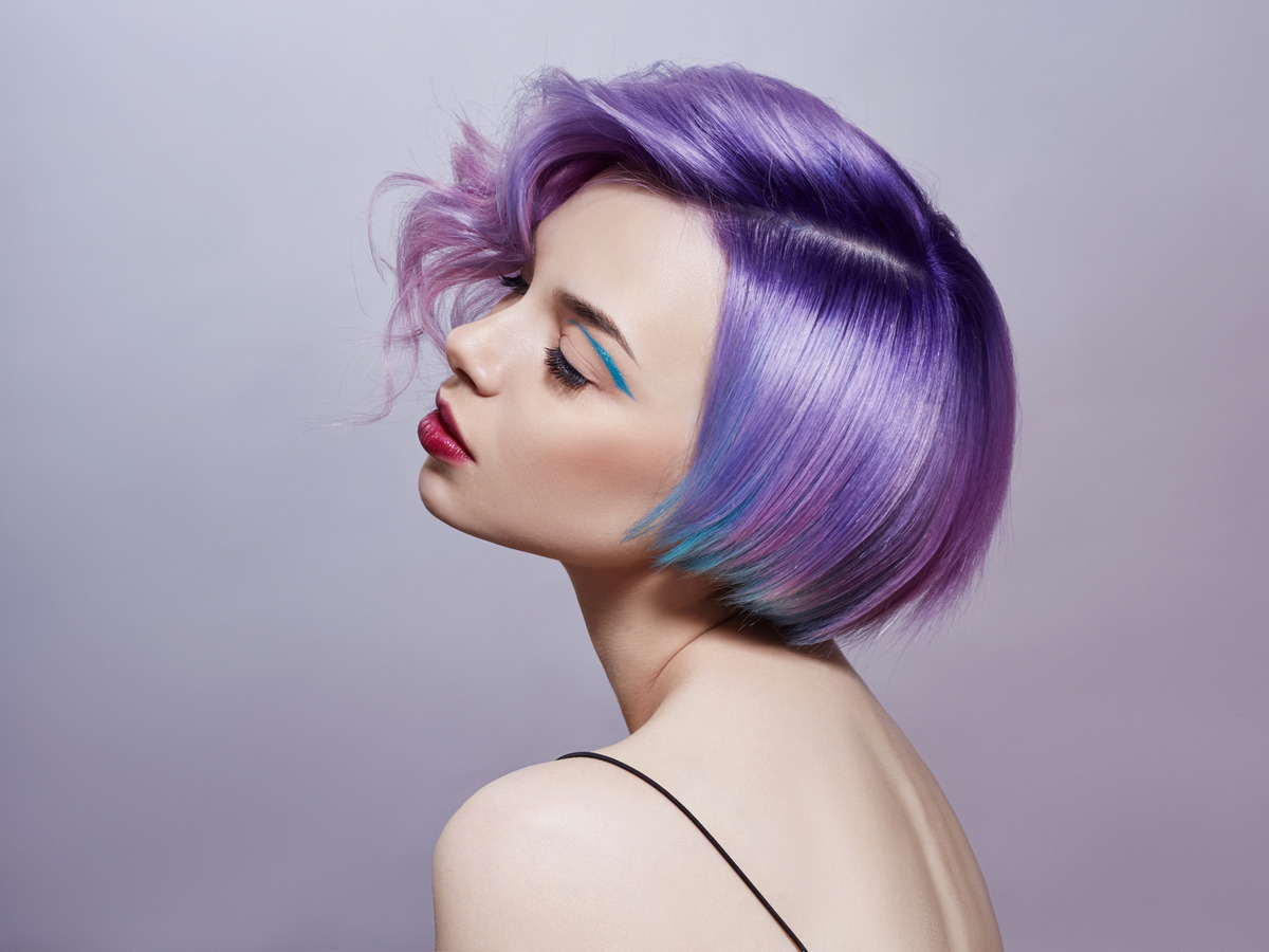 Woman with purple flying hair