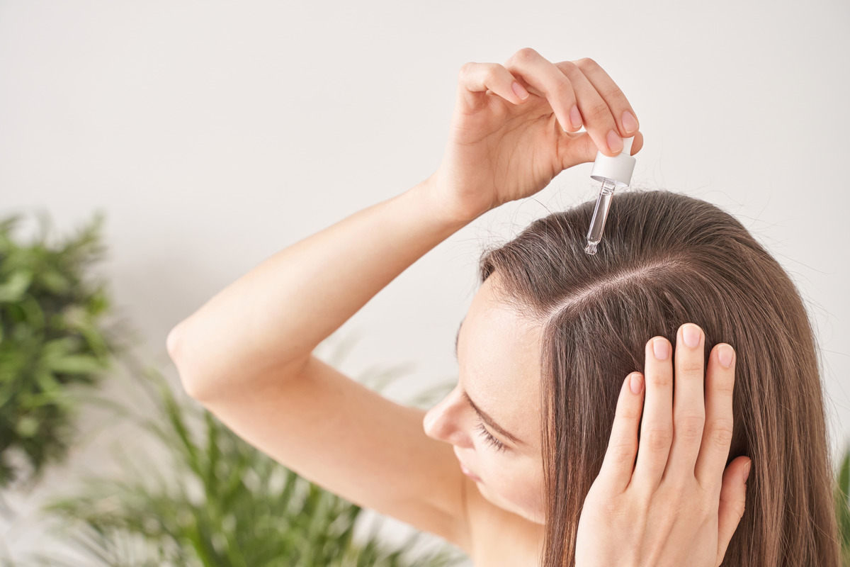 Young woman hair treatment