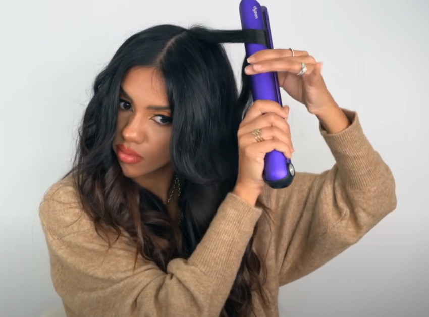 Use the iron curls to make the shape of your bangs