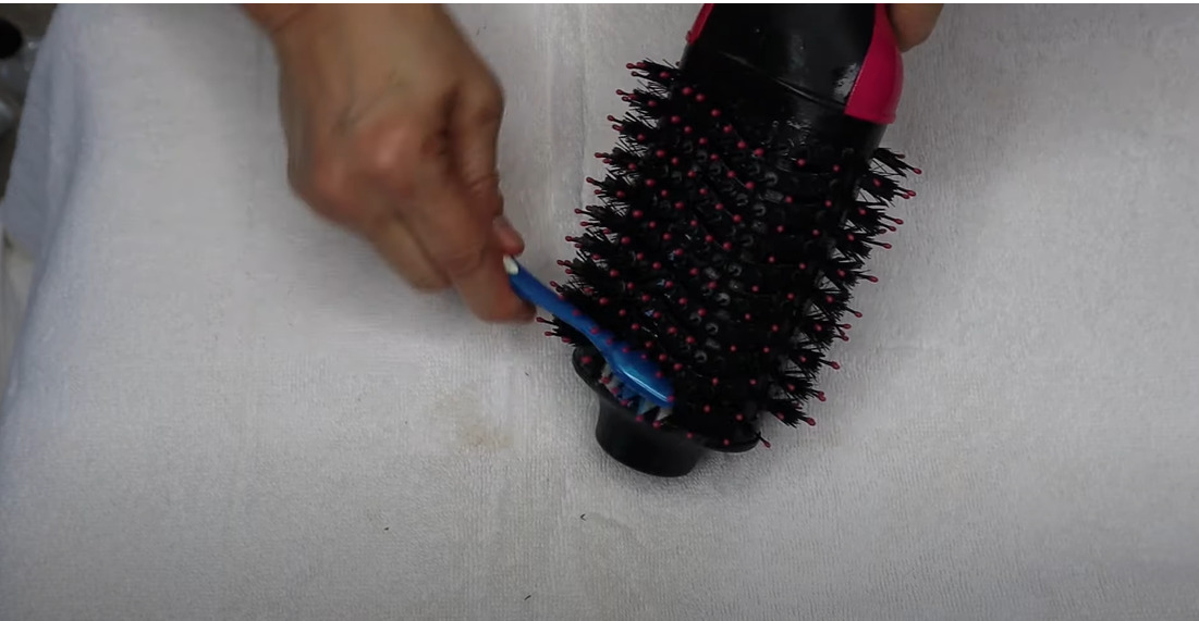 Brush the head or body of the hair dryer brush