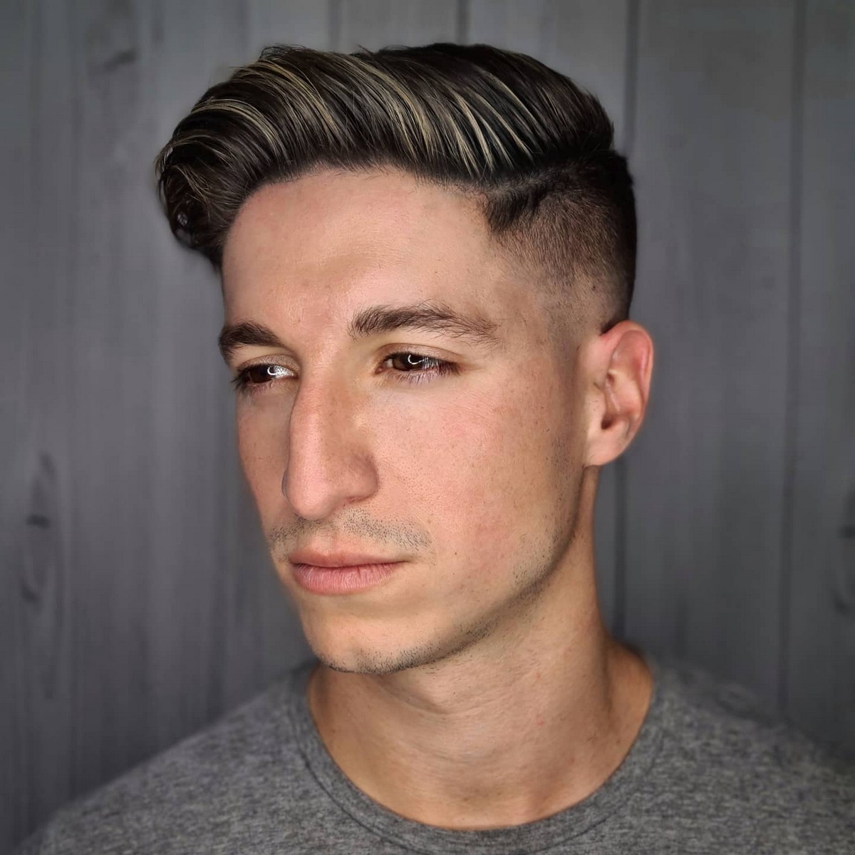 Low Fade Haircut With Highlights 