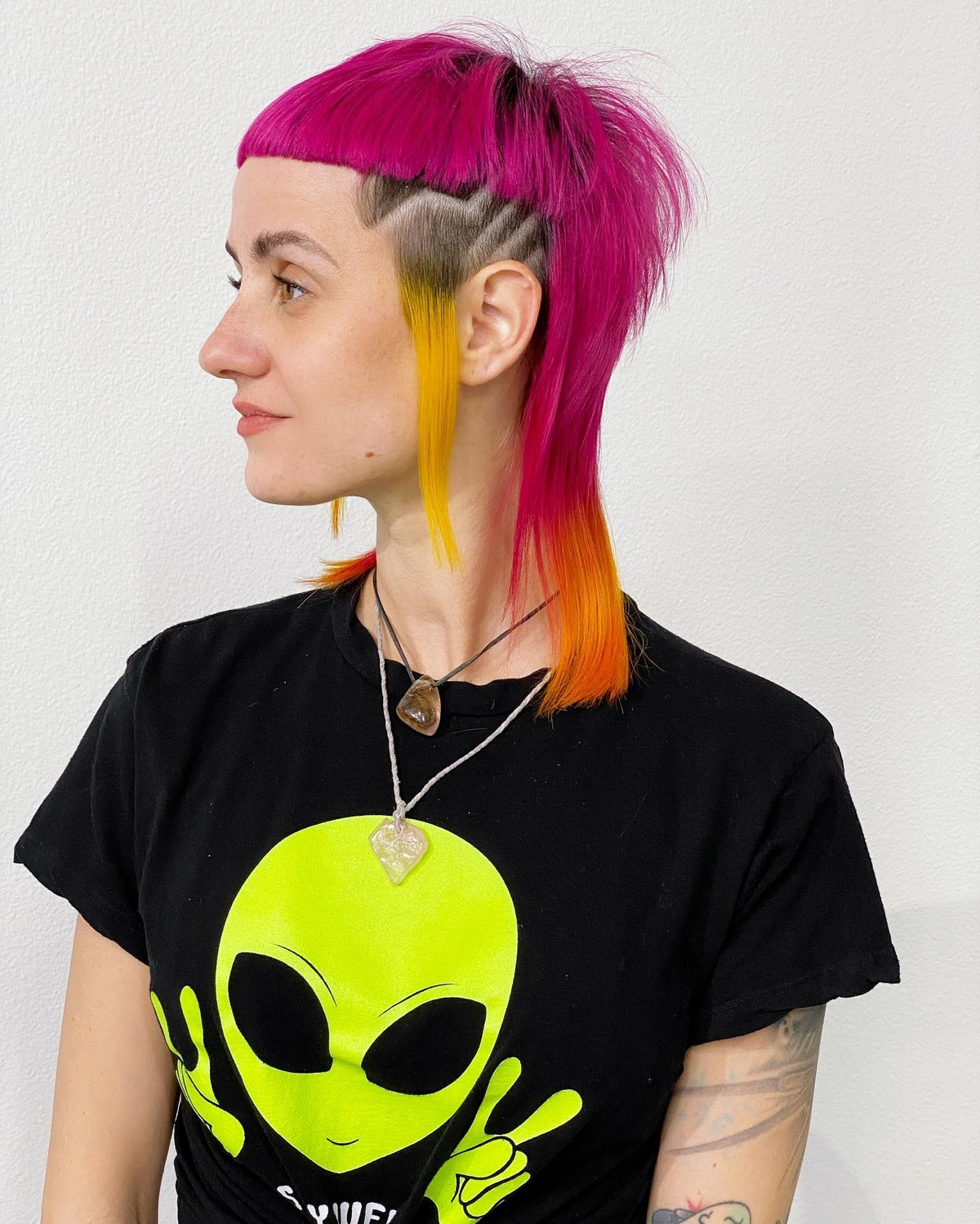 Girl with colorful hair shag haircut line