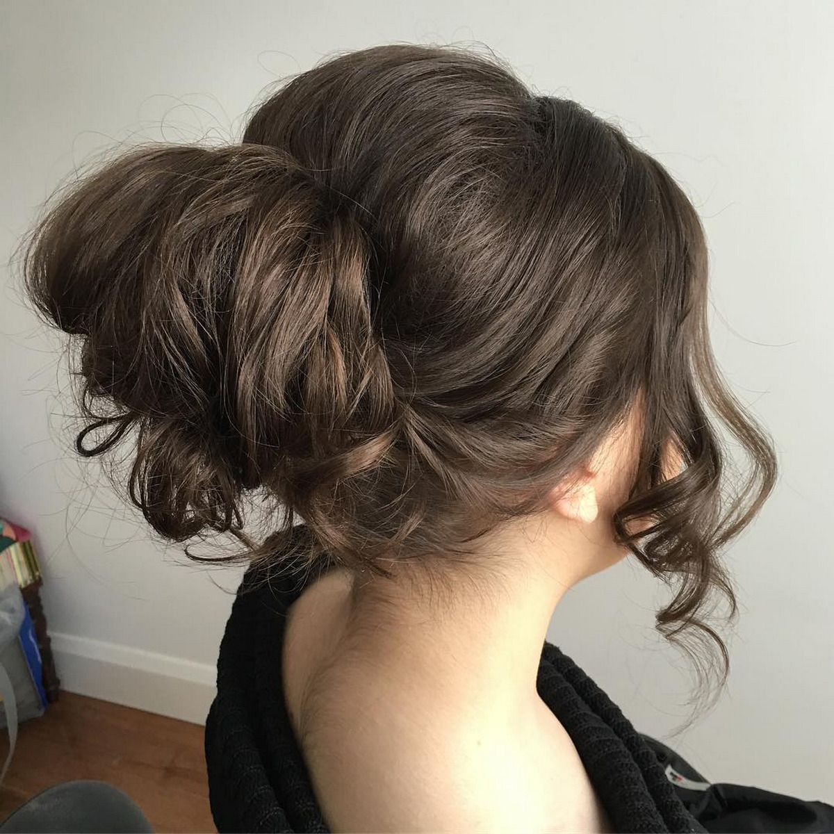 Loose Bun With Curled Fringe