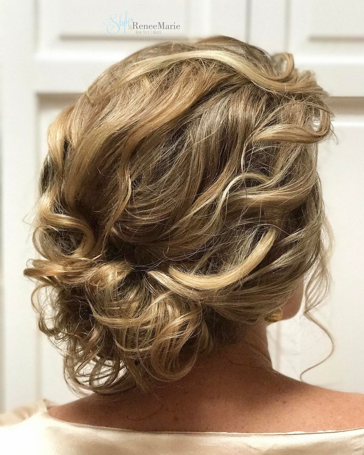 Romantic Frizzy Low Bun