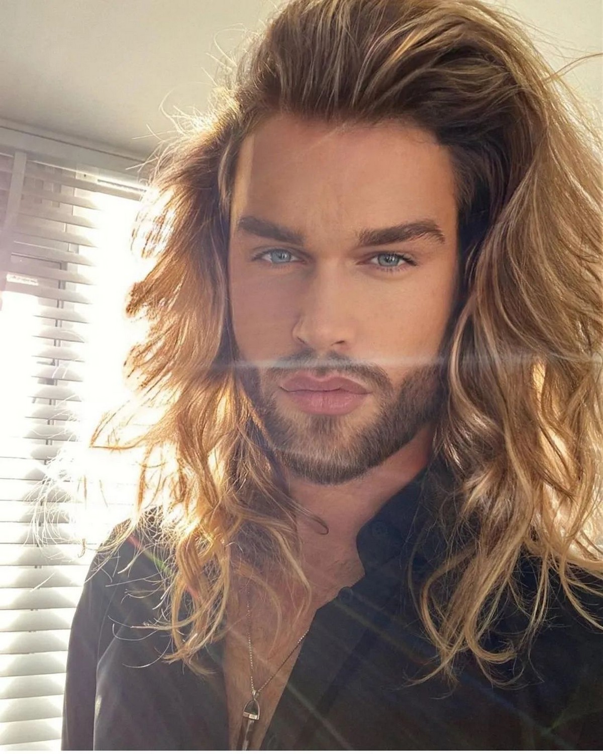 Side part with curly hair