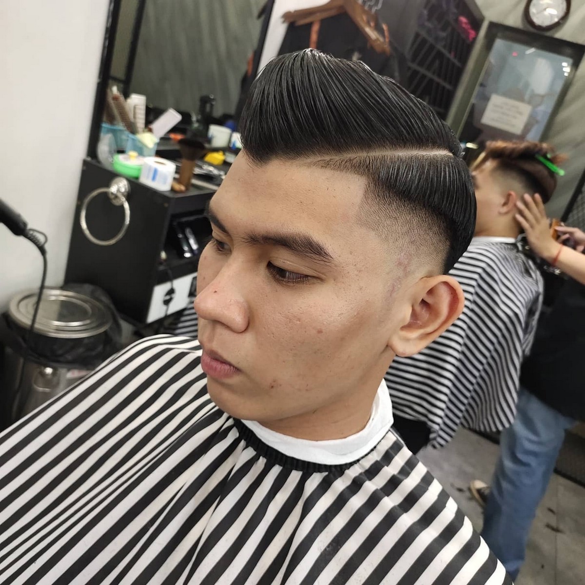 Slick Side Ducktail Haircut