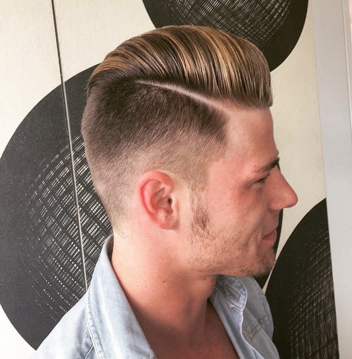 Slicked Back Side Part With Golden Blonde Highlights