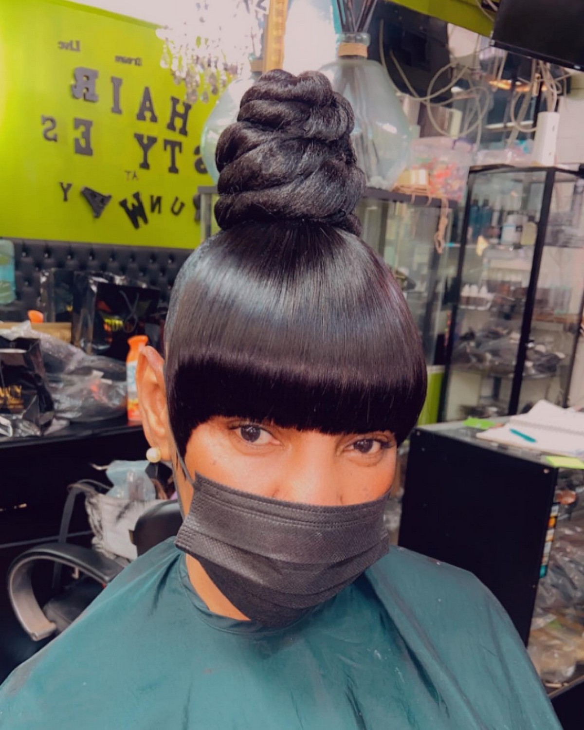 High Bun With Bangs