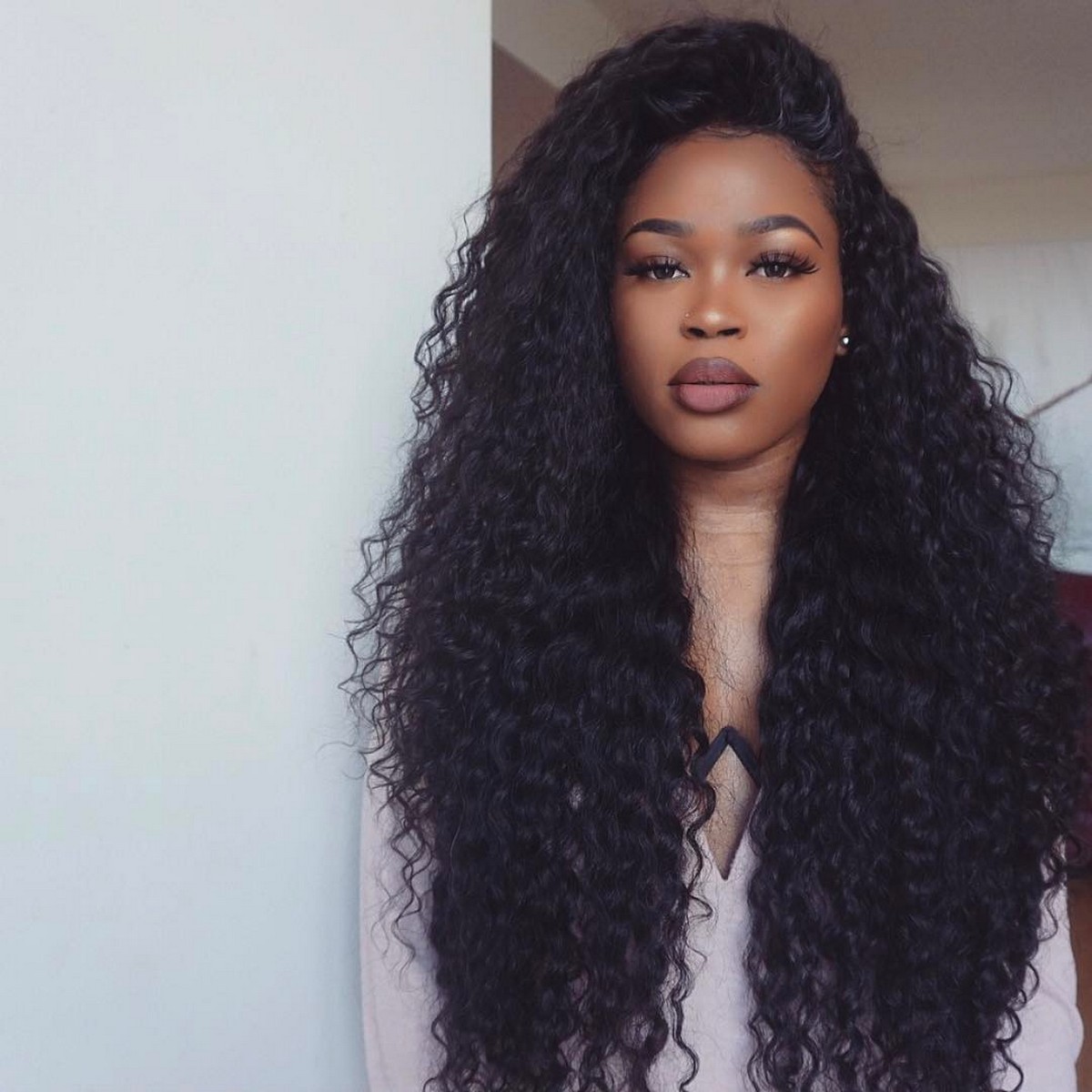 Long Natural Curls With Deep Side Parted 