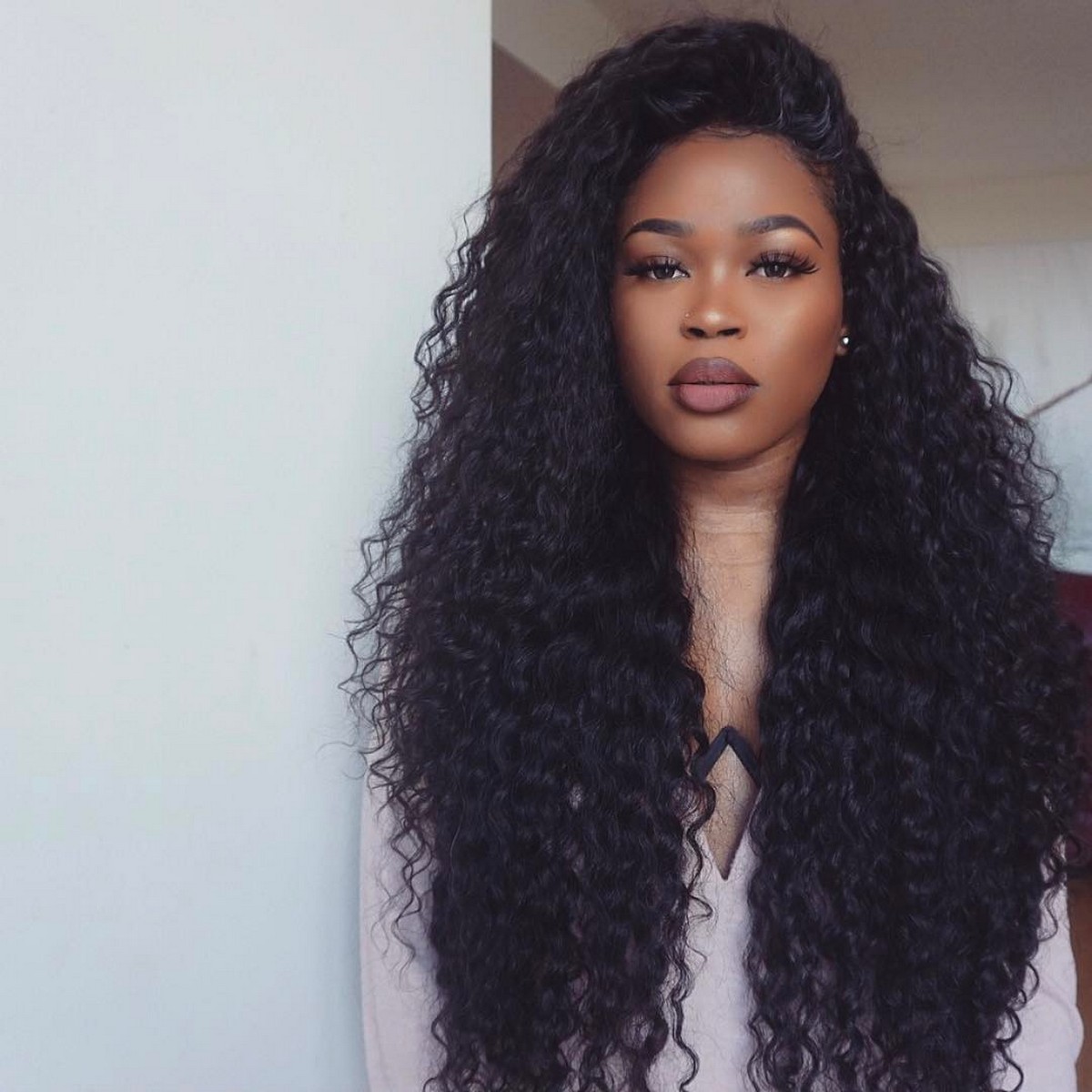 Long Natural Curls With Deep Side Parted