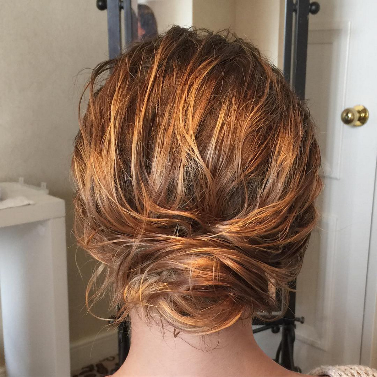 Messy Chignon Bun For Curly Wavy Hair