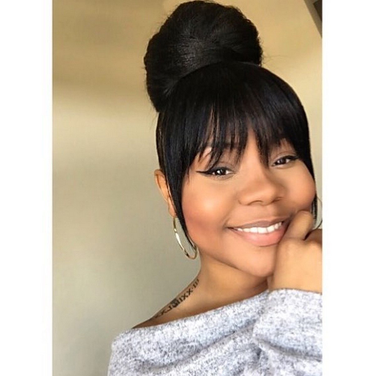High Bun With Faux Bangs