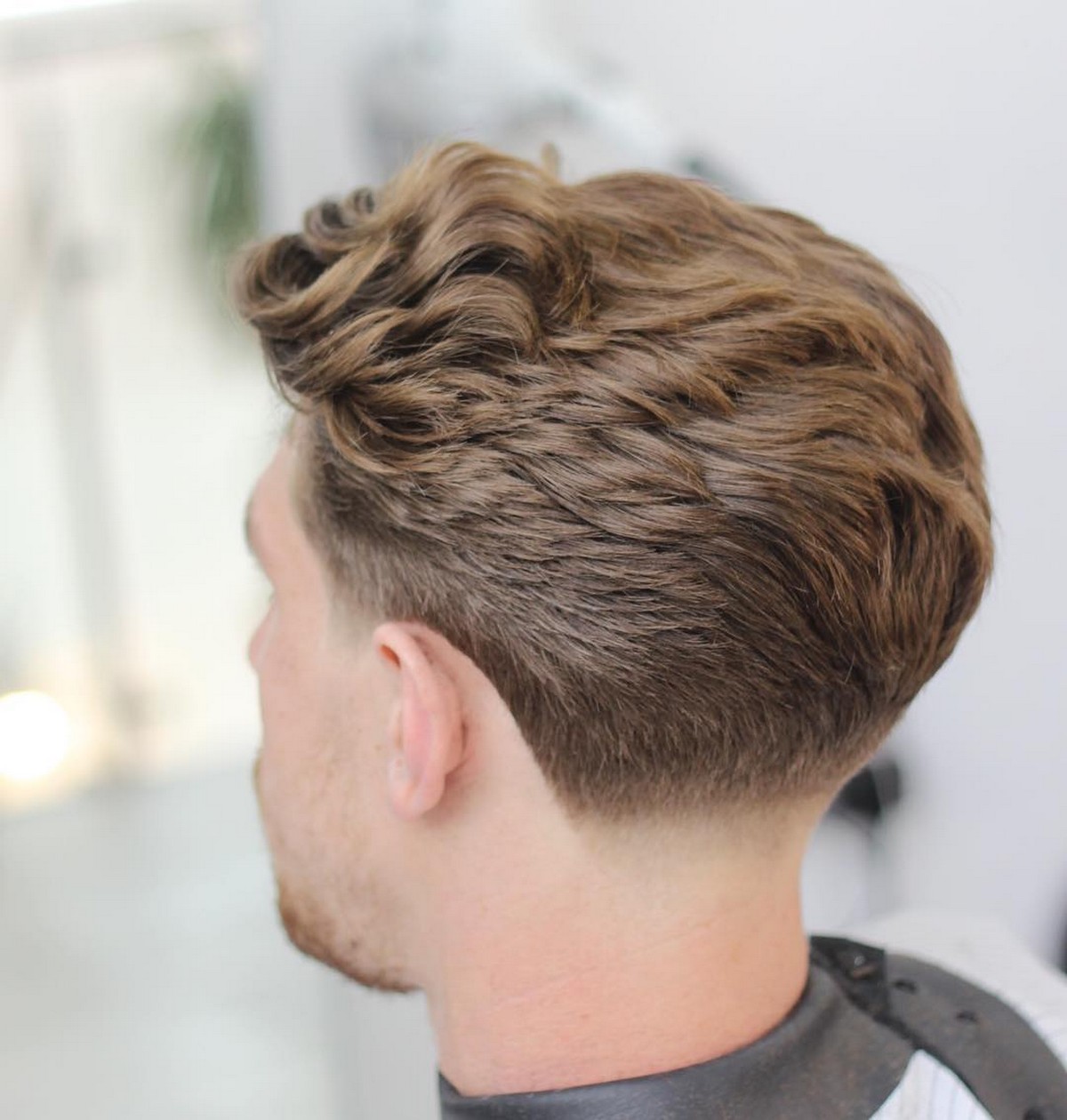 Medium Wavy Low Fade