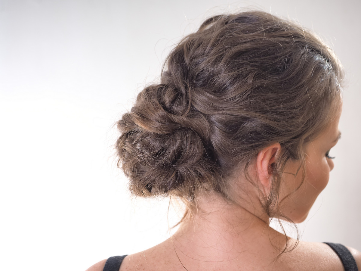 Fizzy Wavy Hair In A Low Bundle