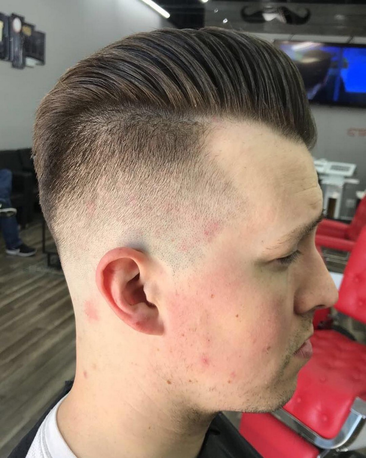 High Shaved Side With Ducktail Hair