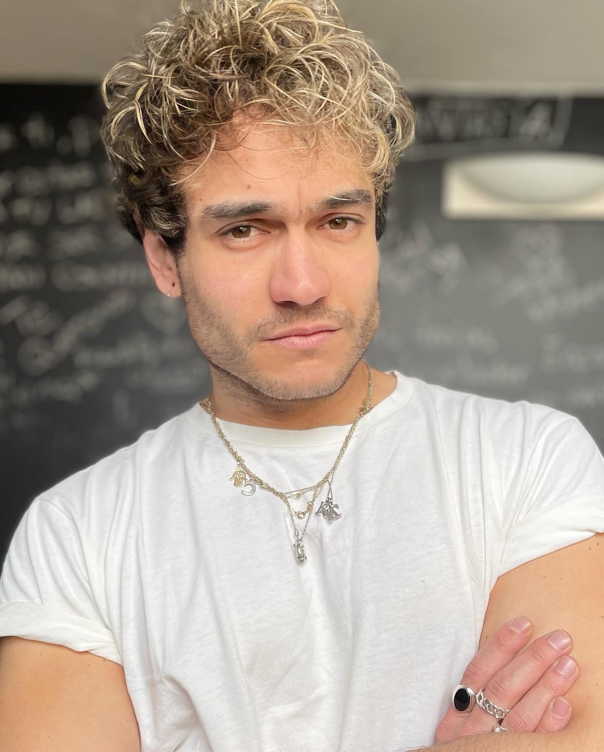Curly Men's Hair With Blonde Highlights