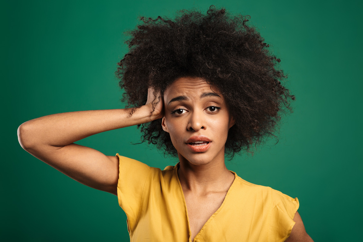 A young woman with her rat nest hair