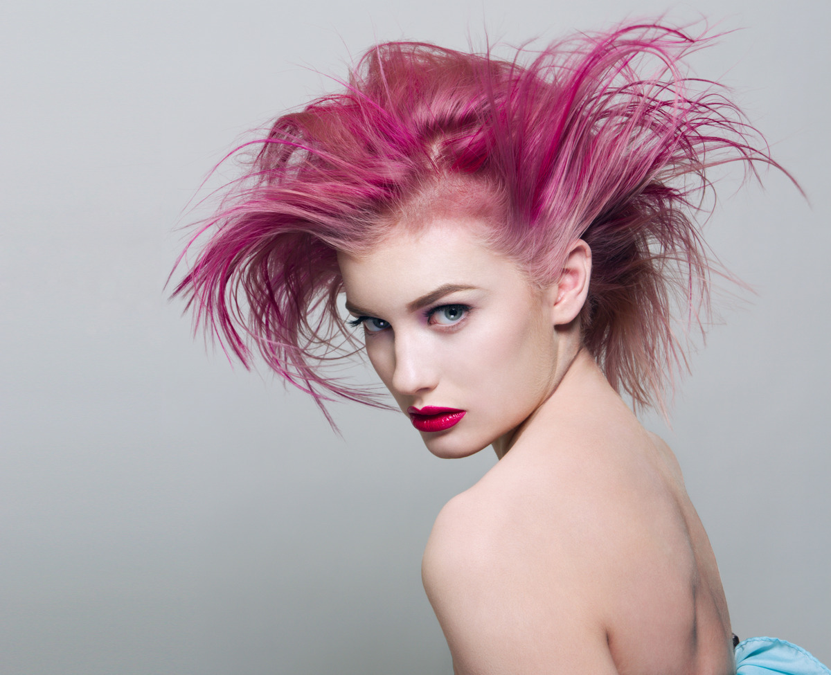 Beautiful young woman with dyed purple hair