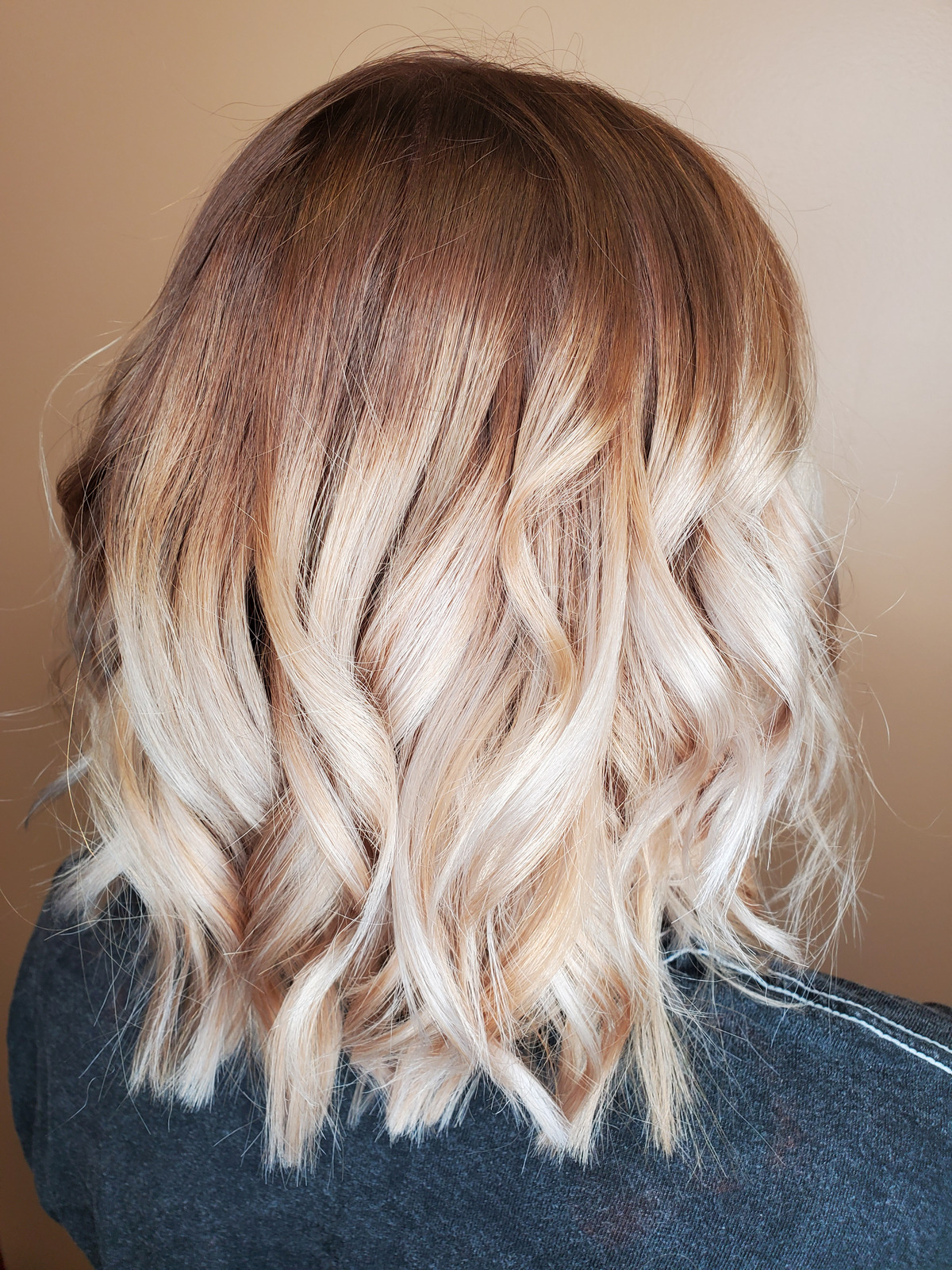 Girl with hair highlights at salon
