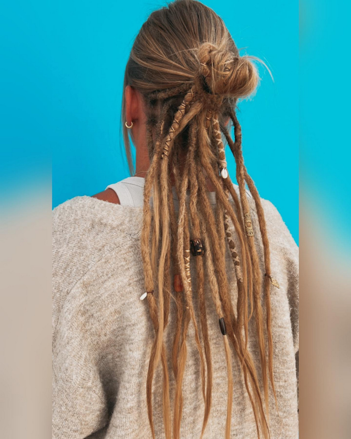 Girl with straight hair and dreadlocks styles