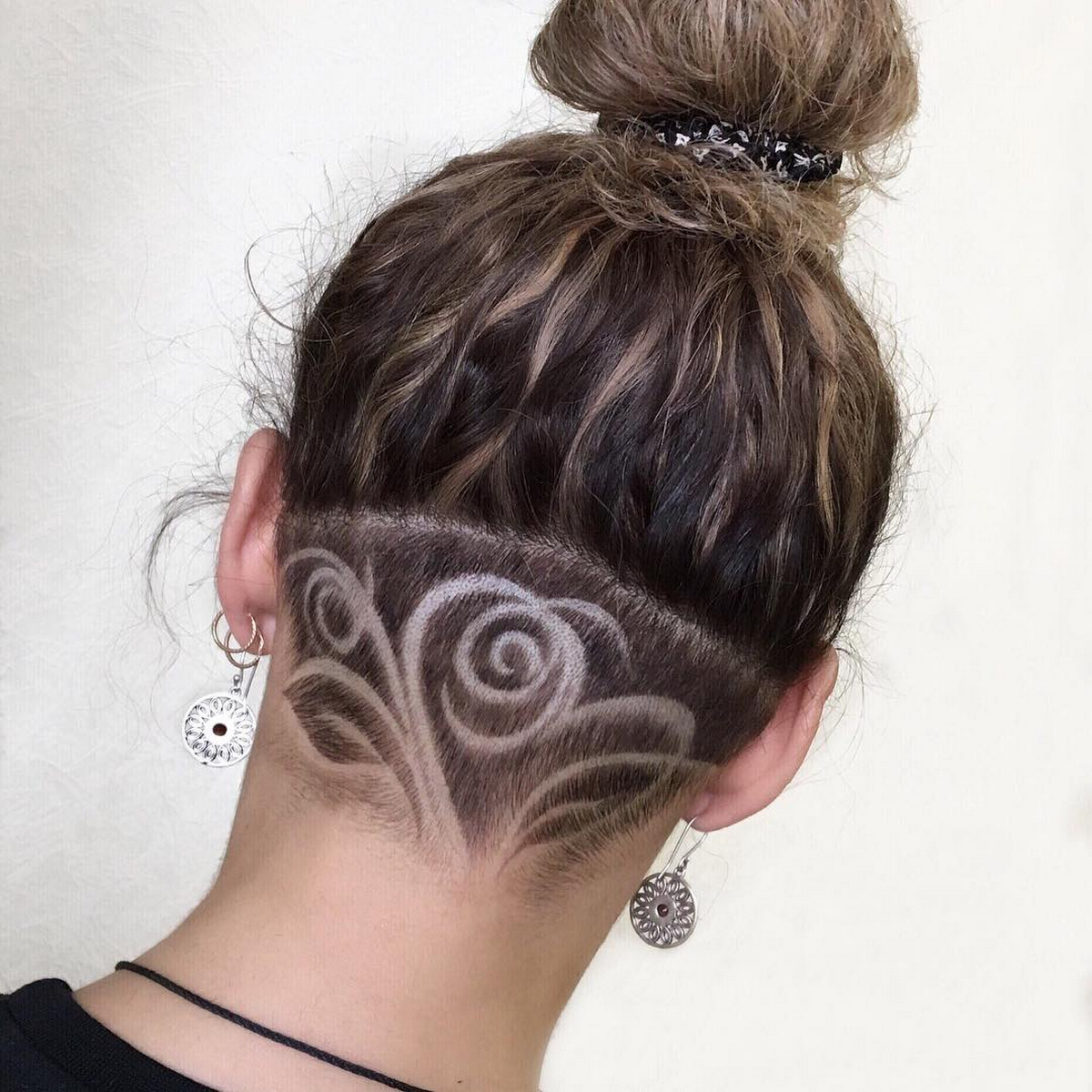 High Bun Undercut With Rose Design