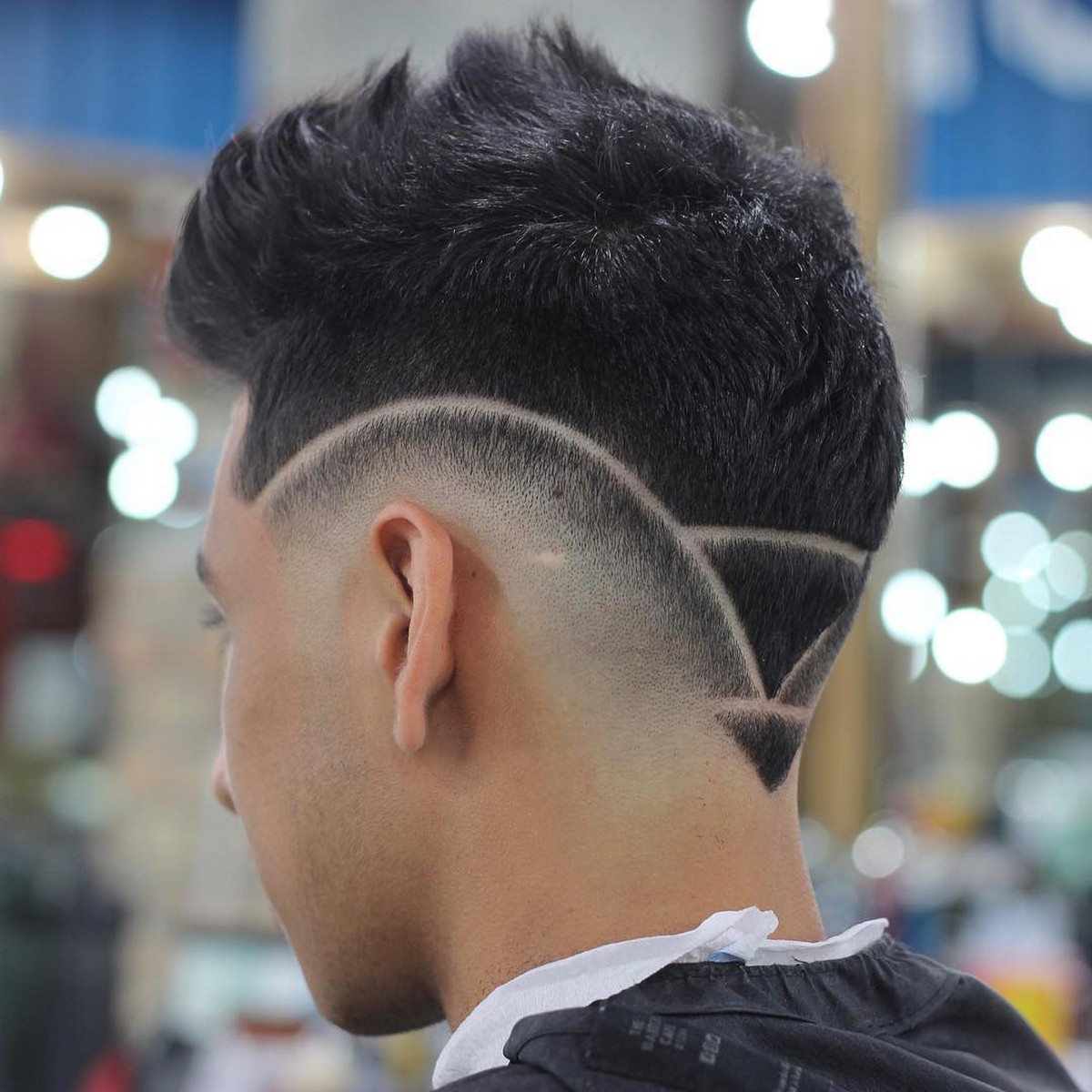 A cool young man with haircut lines