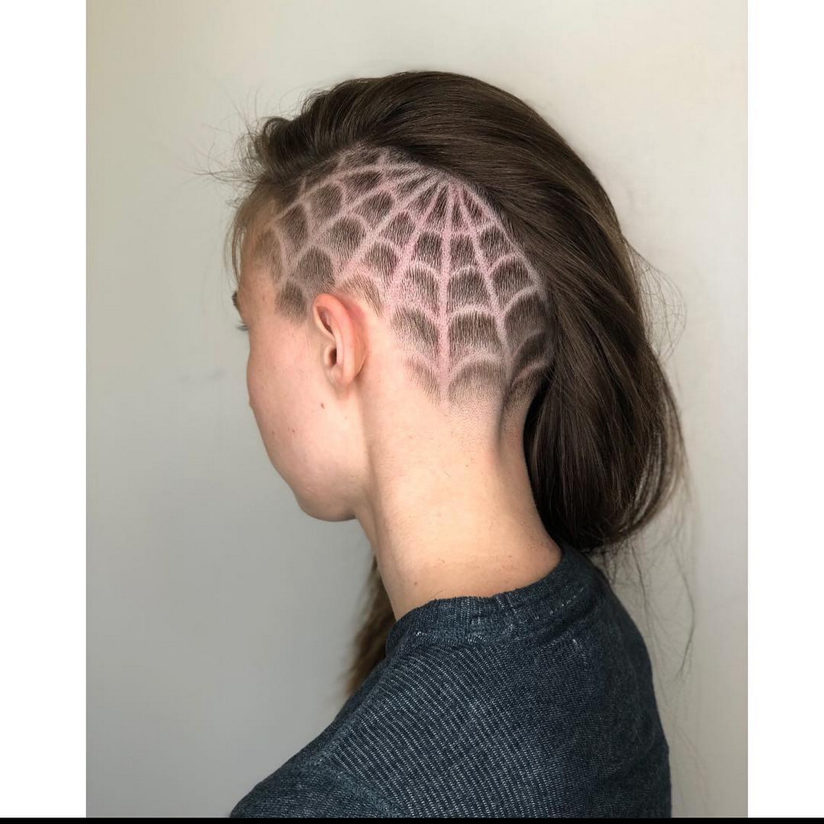 Long Hair Undercut With Spiderweb Design