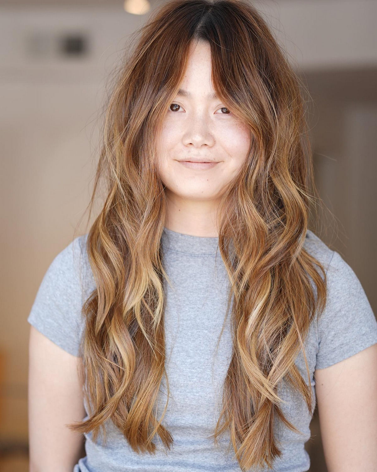 Long Seamless Layers With Curtain Bangs 