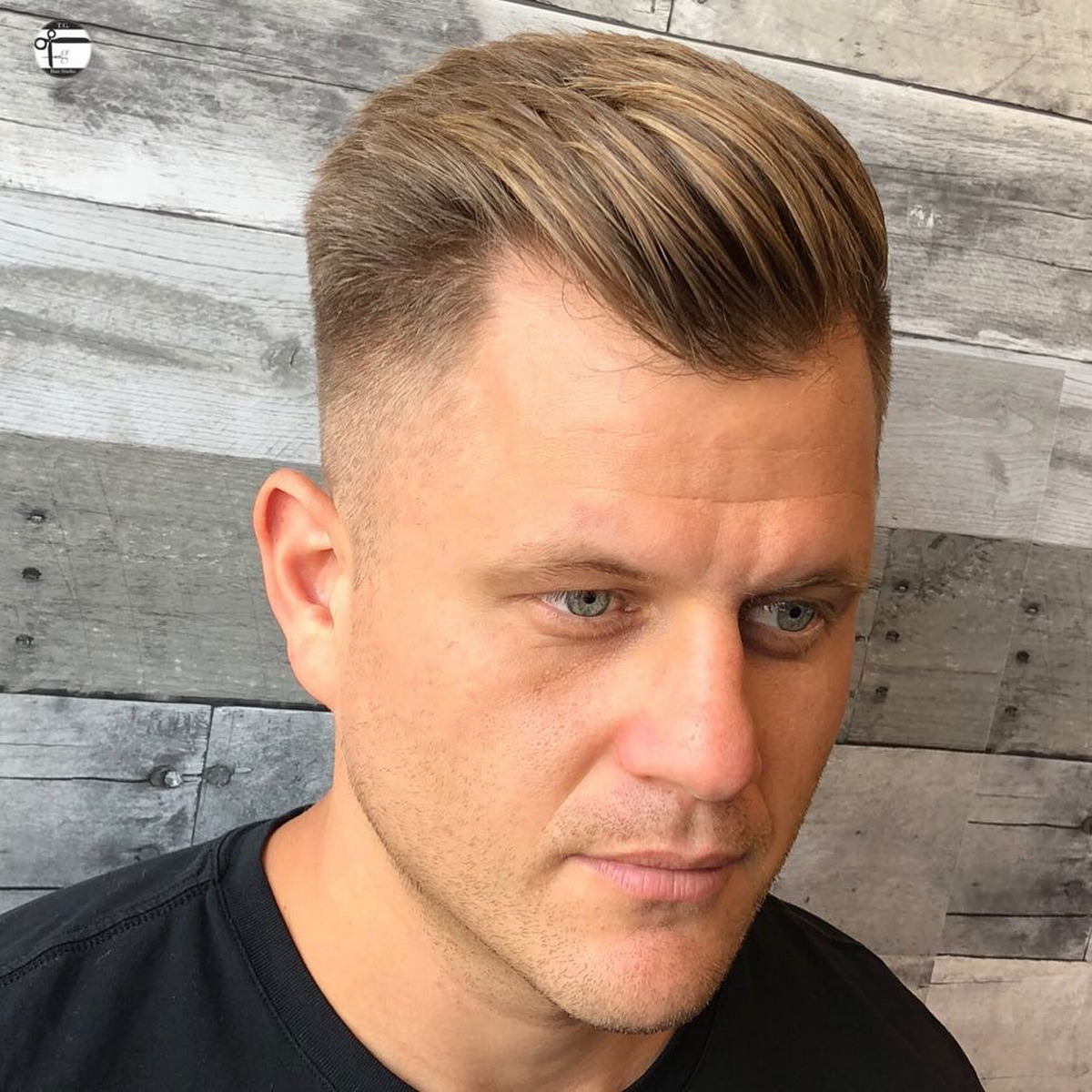 Sculpted Slicked Back Hairstyle With Shaved Sides