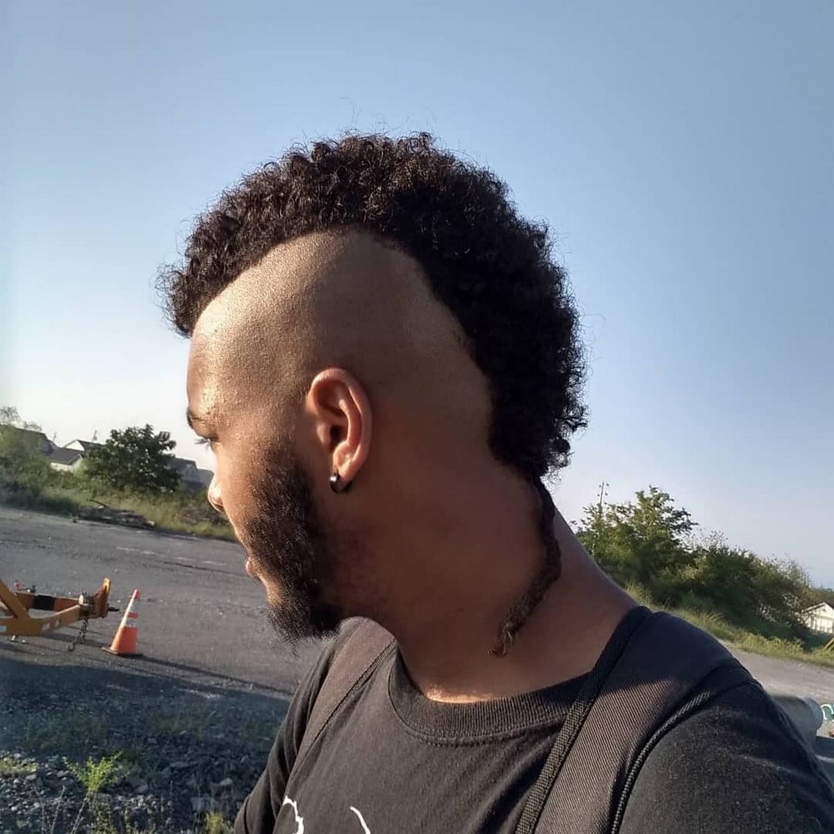 Shaved Mohawk With Dreadlocks Tail