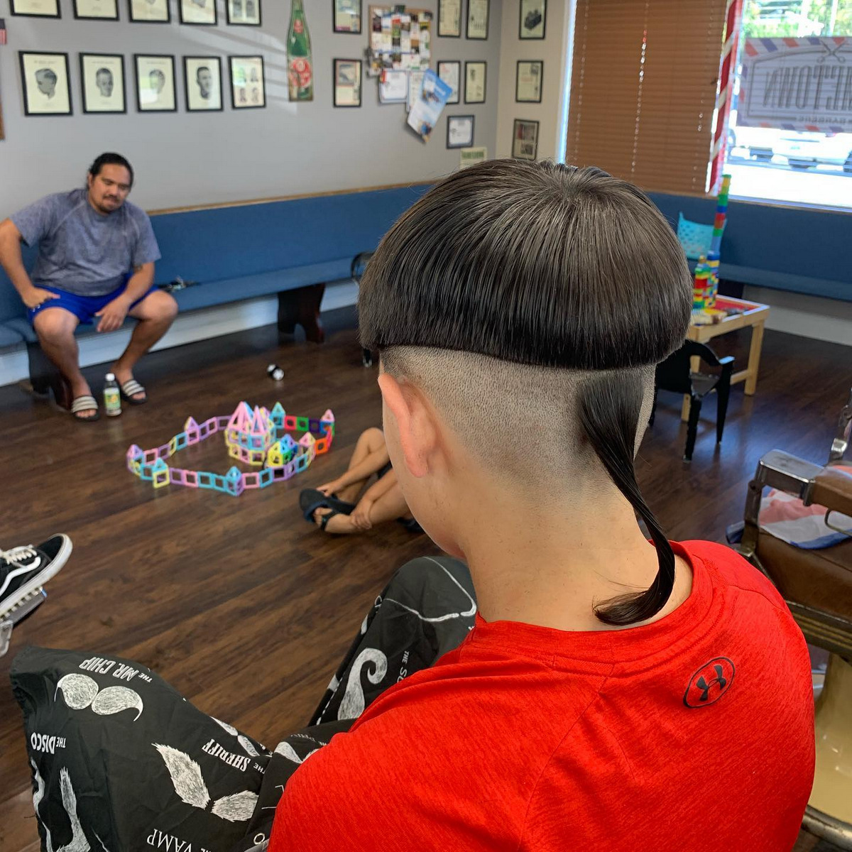 Sleek Bowl Haircut With Shiny Tail