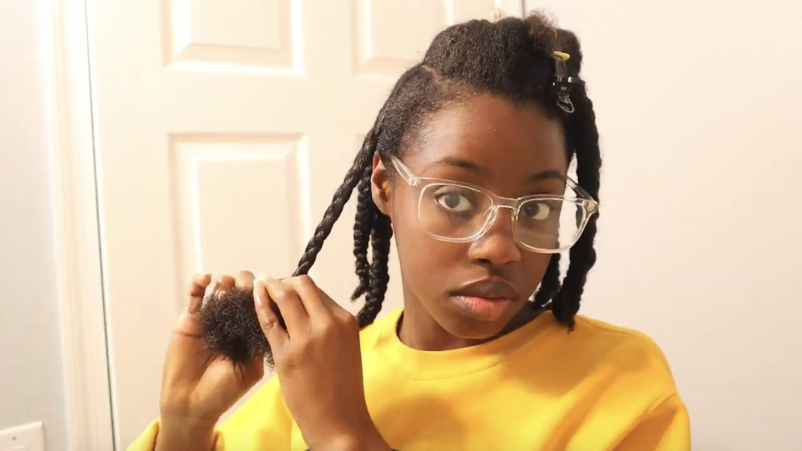 Braiding mini twists are a great way to stretch your hair without using heat. This allows you to style your hair in any way you want