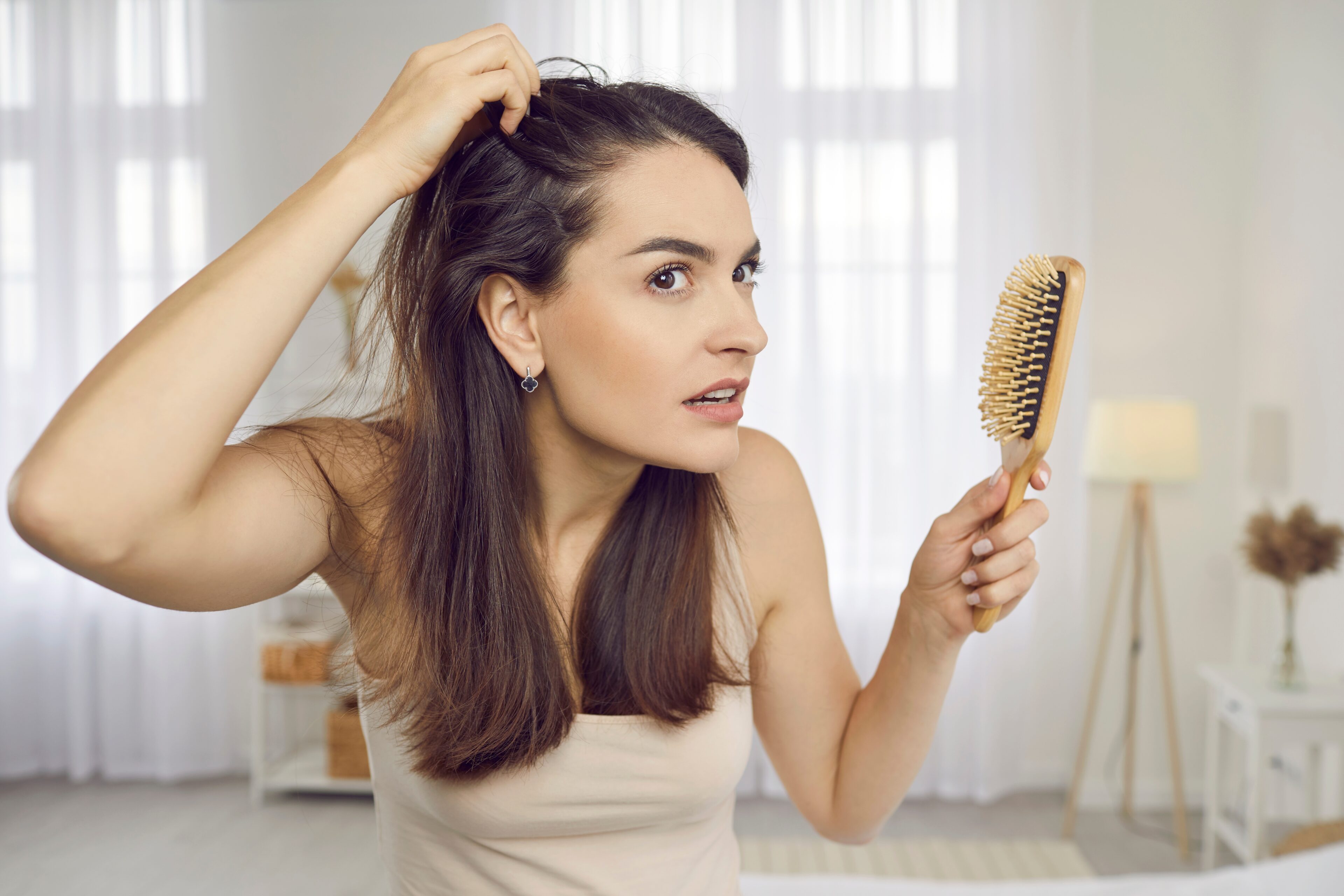 A Woman Checking Her Hair