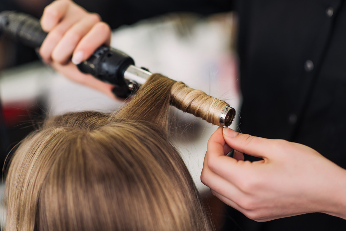 The stylist uses styling techniques to achieve the desired outcome