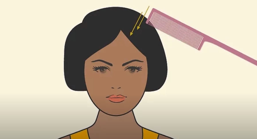 Model of girl using a comb to gently remove the paint from her hair