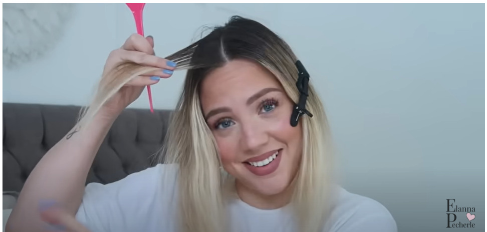 Section your hair by using a comb and clip